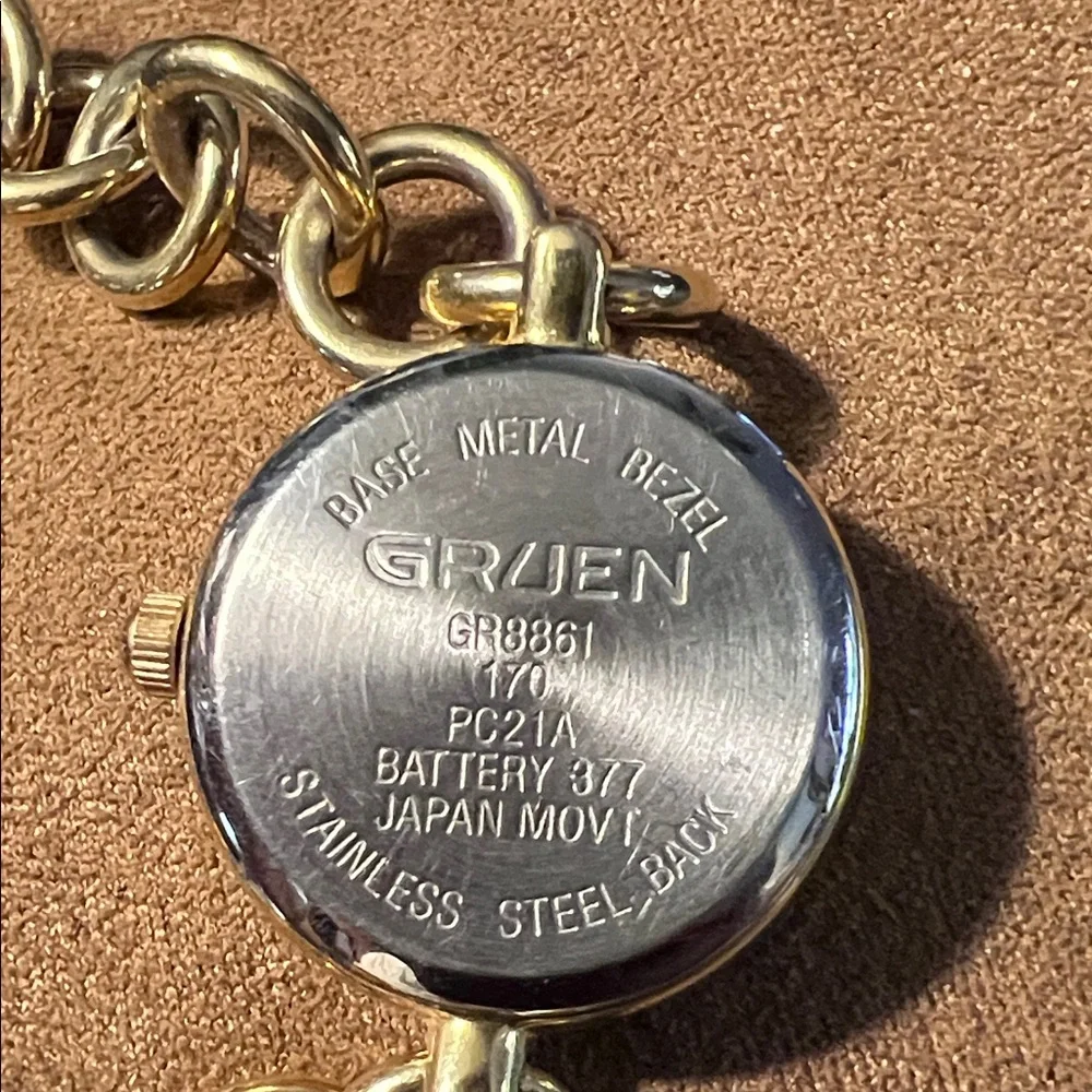 Gold-Tone Charm Bracelet Watch with Heart Locket